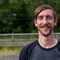 Will Soffe, a moustachioed mountain biker